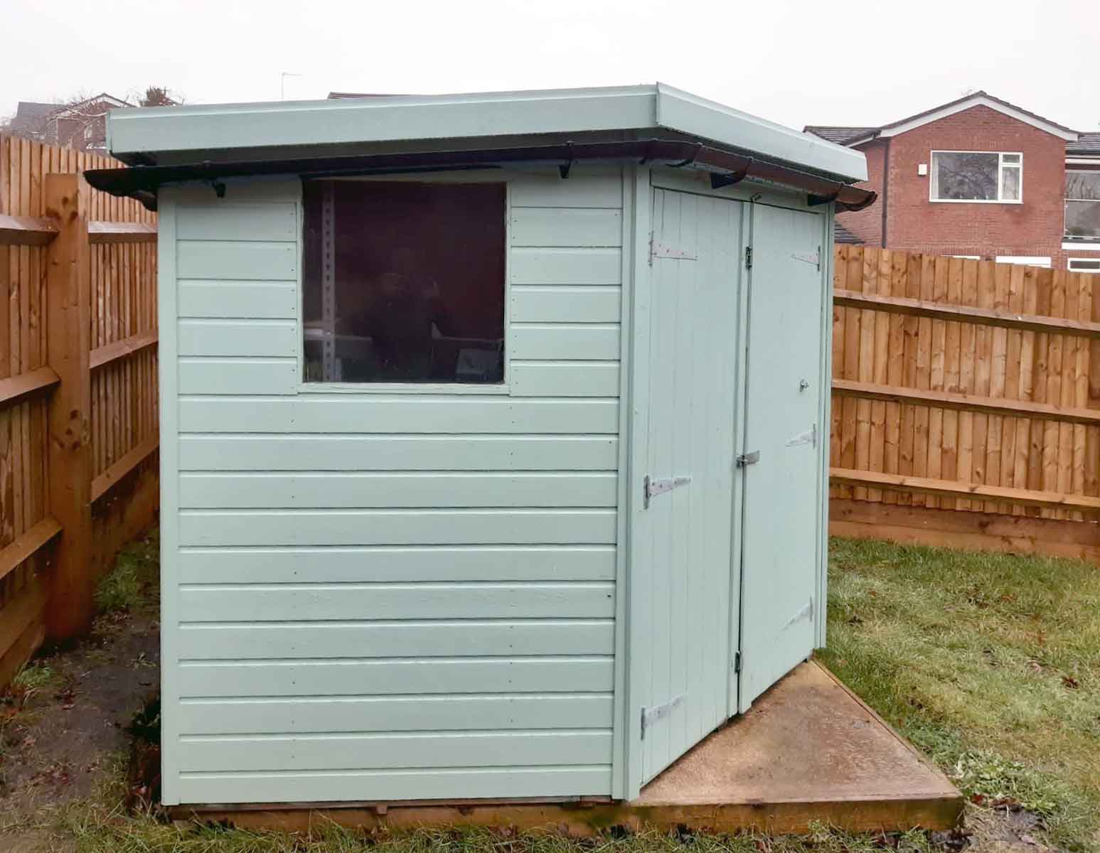 Corner Pent Shed painted in Protek Royal Exterior