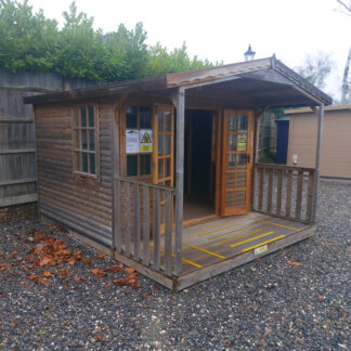 Loglap cabin 10x8 w 4ft veranda left corner view