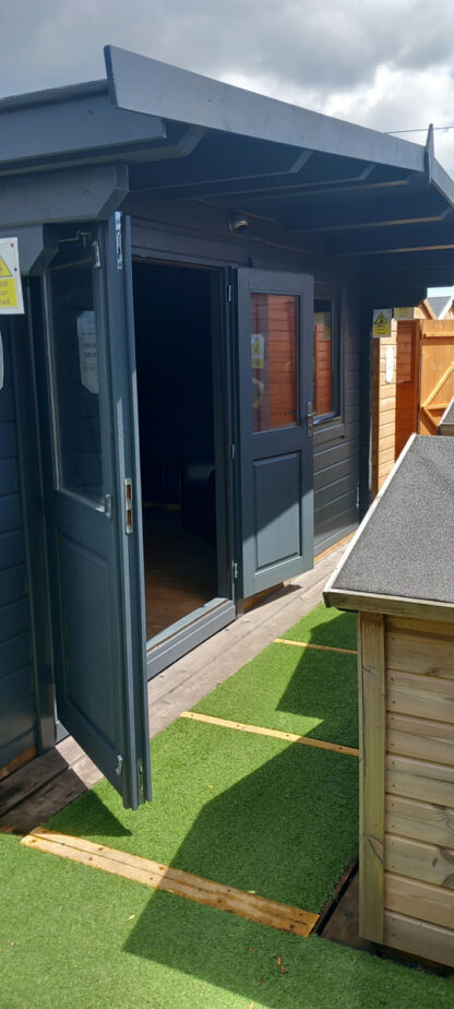 4.5M x 3.5M Untreated Interlocking Surrey Log Cabin (70mm Walls) (Ex Display) - Image 3